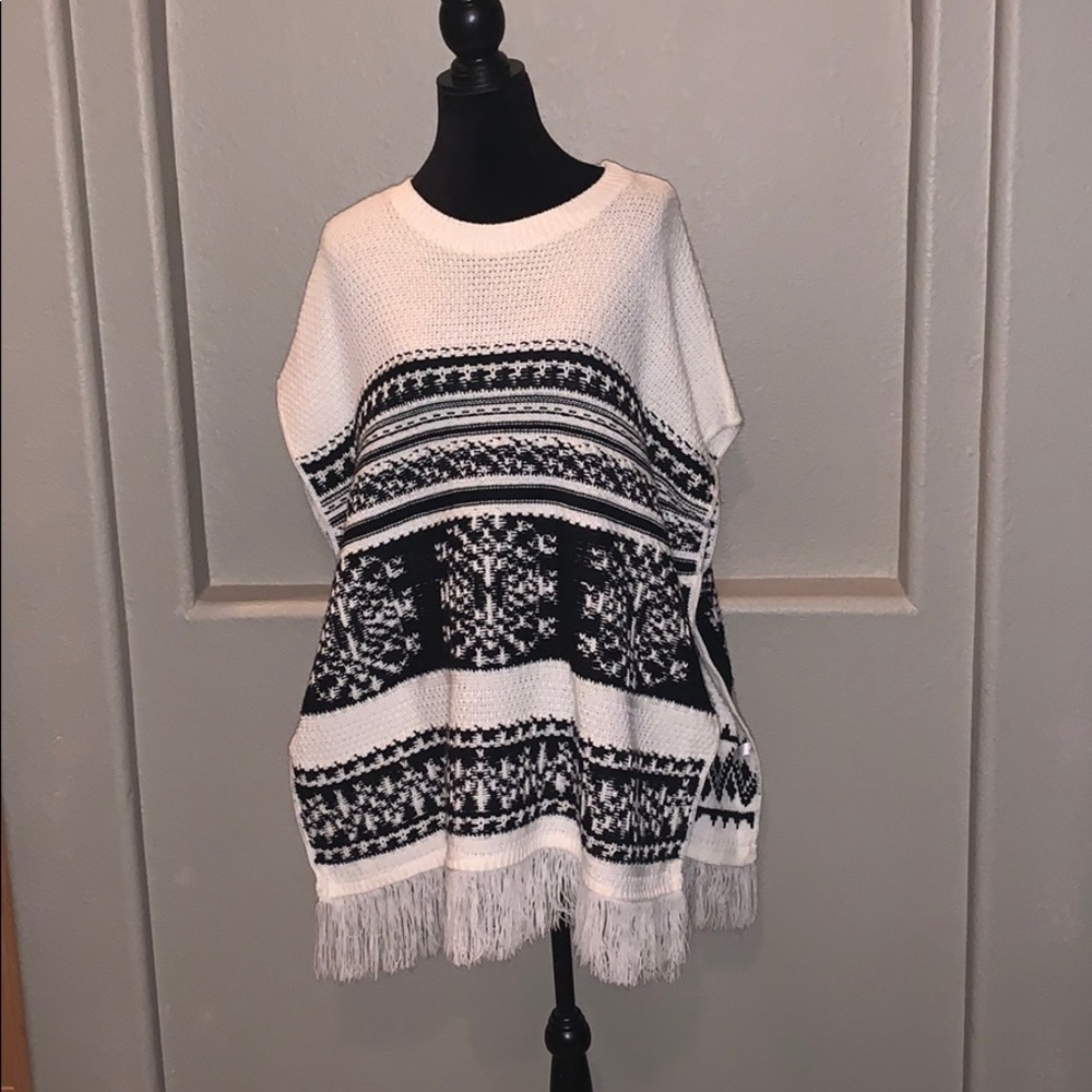 White and black poncho